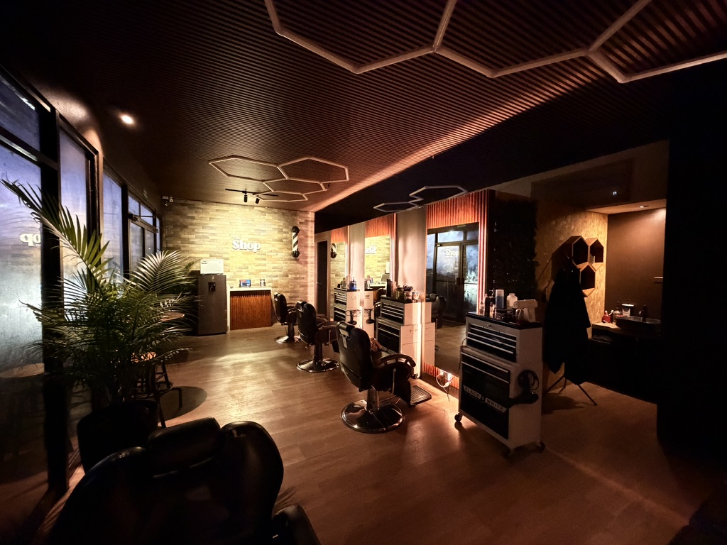 The Shop's new studio floor with stations and honeycomb lighting